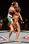 ANAHEIM, CA - FEBRUARY 23:  Liz Carmouche (top) attempts to submit Ronda Rousey in their women's bantamweight title fight during UFC 157 at Honda Center on February 23, 2013 in Anaheim, California.  (Photo by Josh Hedges/Zuffa LLC/Zuffa LLC via Getty Images) *** Local Caption *** Ronda Rousey; Liz Carmouche