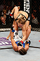 ANAHEIM, CA - FEBRUARY 23:  Ronda Rousey (top) punches Liz Carmouche in their women's bantamweight title fight during UFC 157 at Honda Center on February 23, 2013 in Anaheim, California.  (Photo by Josh Hedges/Zuffa LLC/Zuffa LLC via Getty Images) *** Local Caption *** Ronda Rousey; Liz Carmouche