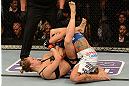 ANAHEIM, CA - FEBRUARY 23:  Ronda Rousey (left) attempts to submit Liz Carmouche in their women's bantamweight title fight during UFC 157 at Honda Center on February 23, 2013 in Anaheim, California.  (Photo by Donald Miralle/Zuffa LLC/Zuffa LLC via Getty Images) *** Local Caption *** Ronda Rousey; Liz Carmouche