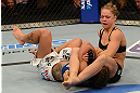 ANAHEIM, CA - FEBRUARY 23:  Ronda Rousey (right) attempts to submit Liz Carmouche in their women's bantamweight title fight during UFC 157 at Honda Center on February 23, 2013 in Anaheim, California.  (Photo by Donald Miralle/Zuffa LLC/Zuffa LLC via Getty Images) *** Local Caption *** Ronda Rousey; Liz Carmouche
