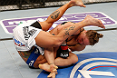 ANAHEIM, CA - FEBRUARY 23:  Ronda Rousey (right) attempts to submit Liz Carmouche in their women's bantamweight title fight during UFC 157 at Honda Center on February 23, 2013 in Anaheim, California.  (Photo by Josh Hedges/Zuffa LLC/Zuffa LLC via Getty Images) *** Local Caption *** Ronda Rousey; Liz Carmouche