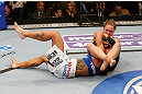 ANAHEIM, CA - FEBRUARY 23:  Ronda Rousey (right) attempts to submit Liz Carmouche in their women's bantamweight title fight during UFC 157 at Honda Center on February 23, 2013 in Anaheim, California.  (Photo by Josh Hedges/Zuffa LLC/Zuffa LLC via Getty Images) *** Local Caption *** Ronda Rousey; Liz Carmouche