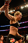 ANAHEIM, CA - FEBRUARY 23:  Ronda Rousey celebrates her victory over Liz Carmouche in their women's bantamweight title fight during UFC 157 at Honda Center on February 23, 2013 in Anaheim, California.  (Photo by Donald Miralle/Zuffa LLC/Zuffa LLC via Getty Images) *** Local Caption *** Ronda Rousey; Liz Carmouche