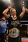 ANAHEIM, CA - FEBRUARY 23:  Ronda Rousey reacts to her victory over Liz Carmouche in their women's bantamweight title fight during UFC 157 at Honda Center on February 23, 2013 in Anaheim, California.  (Photo by Donald Miralle/Zuffa LLC/Zuffa LLC via Getty Images) *** Local Caption *** Ronda Rousey; Liz Carmouche