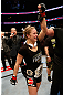 ANAHEIM, CA - FEBRUARY 23:  Ronda Rousey reacts to her victory over Liz Carmouche in their women's bantamweight title fight during UFC 157 at Honda Center on February 23, 2013 in Anaheim, California.  (Photo by Josh Hedges/Zuffa LLC/Zuffa LLC via Getty Images) *** Local Caption *** Ronda Rousey; Liz Carmouche