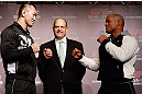 TOKYO, JAPAN - FEBRUARY 28: (L-R) Opponents Yushin Okami and Hector Lombard face off during a UFC press conference at the Hilton Sjinjuku Hotel on February 28, 2013 in Tokyo, Japan. (Photo by Josh Hedges/Zuffa LLC/Zuffa LLC via Getty Images)