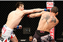 SAITAMA, JAPAN - MARCH 03:  (L-R) Hyun Gyu Lim punches Marcelo Guimaraes in their welterweight fight during the UFC on FUEL TV event at Saitama Super Arena on March 3, 2013 in Saitama, Japan.  (Photo by Josh Hedges/Zuffa LLC/Zuffa LLC via Getty Images)