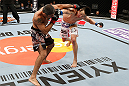 SAITAMA, JAPAN - MARCH 03:  (R-L) Hyun Gyu Lim and Marcelo Guimaraes trade punches in their welterweight fight during the UFC on FUEL TV event at Saitama Super Arena on March 3, 2013 in Saitama, Japan.  (Photo by Josh Hedges/Zuffa LLC/Zuffa LLC via Getty Images)