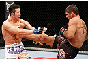 SAITAMA, JAPAN - MARCH 03:  (R-L) Marcelo Guimaraes kicks Hyun Gyu Lim in their welterweight fight during the UFC on FUEL TV event at Saitama Super Arena on March 3, 2013 in Saitama, Japan.  (Photo by Josh Hedges/Zuffa LLC/Zuffa LLC via Getty Images)