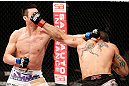 SAITAMA, JAPAN - MARCH 03:  (R-L) Marcelo Guimaraes and Hyun Gyu Lim trade punches in their welterweight fight during the UFC on FUEL TV event at Saitama Super Arena on March 3, 2013 in Saitama, Japan.  (Photo by Josh Hedges/Zuffa LLC/Zuffa LLC via Getty Images)