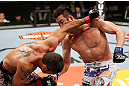 SAITAMA, JAPAN - MARCH 03:  (R-L) Hyun Gyu Lim punches Marcelo Guimaraes in their welterweight fight during the UFC on FUEL TV event at Saitama Super Arena on March 3, 2013 in Saitama, Japan.  (Photo by Josh Hedges/Zuffa LLC/Zuffa LLC via Getty Images)