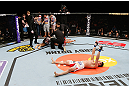 SAITAMA, JAPAN - MARCH 03:  Hyun Gyu Lim reacts after knocking out Marcelo Guimaraes in their welterweight fight during the UFC on FUEL TV event at Saitama Super Arena on March 3, 2013 in Saitama, Japan.  (Photo by Josh Hedges/Zuffa LLC/Zuffa LLC via Getty Images)
