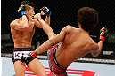 SAITAMA, JAPAN - MARCH 03:  (R-L) Alex Caceres kicks Kyung Ho Kang in their bantamweight fight during the UFC on FUEL TV event at Saitama Super Arena on March 3, 2013 in Saitama, Japan.  (Photo by Josh Hedges/Zuffa LLC/Zuffa LLC via Getty Images)