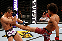 SAITAMA, JAPAN - MARCH 03:  (R-L) Alex Caceres kicks Kyung Ho Kang in their bantamweight fight during the UFC on FUEL TV event at Saitama Super Arena on March 3, 2013 in Saitama, Japan.  (Photo by Josh Hedges/Zuffa LLC/Zuffa LLC via Getty Images)