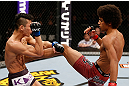 SAITAMA, JAPAN - MARCH 03:  (R-L) Alex Caceres kicks Kyung Ho Kang in their bantamweight fight during the UFC on FUEL TV event at Saitama Super Arena on March 3, 2013 in Saitama, Japan.  (Photo by Josh Hedges/Zuffa LLC/Zuffa LLC via Getty Images)