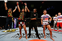SAITAMA, JAPAN - MARCH 03:  Alex Caceres (L) reacts after defeating Kyung Ho Kang in their bantamweight fight during the UFC on FUEL TV event at Saitama Super Arena on March 3, 2013 in Saitama, Japan.  (Photo by Josh Hedges/Zuffa LLC/Zuffa LLC via Getty Images)