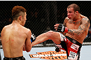 SAITAMA, JAPAN - MARCH 03:  (R-L) Cristiano Marcello kicks Kazuki Tokudome in their lightweight fight during the UFC on FUEL TV event at Saitama Super Arena on March 3, 2013 in Saitama, Japan.  (Photo by Josh Hedges/Zuffa LLC/Zuffa LLC via Getty Images)