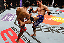 SAITAMA, JAPAN - MARCH 03:  (R-L) Riki Fukuda kicks Brad Tavares in their middleweight fight during the UFC on FUEL TV event at Saitama Super Arena on March 3, 2013 in Saitama, Japan.  (Photo by Josh Hedges/Zuffa LLC/Zuffa LLC via Getty Images)