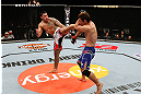 SAITAMA, JAPAN - MARCH 03:  (L-R) Brad Tavares kicks Riki Fukuda in their middleweight fight during the UFC on FUEL TV event at Saitama Super Arena on March 3, 2013 in Saitama, Japan.  (Photo by Josh Hedges/Zuffa LLC/Zuffa LLC via Getty Images)