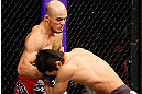 SAITAMA, JAPAN - MARCH 03:  (L-R) Siyar Bahadurzada punches Dong Hyun Kim in their welterweight fight during the UFC on FUEL TV event at Saitama Super Arena on March 3, 2013 in Saitama, Japan.  (Photo by Josh Hedges/Zuffa LLC/Zuffa LLC via Getty Images)