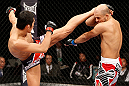 SAITAMA, JAPAN - MARCH 03:  (L-R) Dong Hyun Kim kicks Siyar Bahadurzada in their welterweight fight during the UFC on FUEL TV event at Saitama Super Arena on March 3, 2013 in Saitama, Japan.  (Photo by Josh Hedges/Zuffa LLC/Zuffa LLC via Getty Images)
