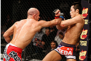 SAITAMA, JAPAN - MARCH 03:  (L-R) Siyar Bahadurzada punches Dong Hyun Kim in their welterweight fight during the UFC on FUEL TV event at Saitama Super Arena on March 3, 2013 in Saitama, Japan.  (Photo by Josh Hedges/Zuffa LLC/Zuffa LLC via Getty Images)