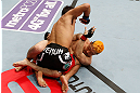 SAITAMA, JAPAN - MARCH 03:  (L-R) Rani Yahya punches Mizuto Hirota in their featherweight fight during the UFC on FUEL TV event at Saitama Super Arena on March 3, 2013 in Saitama, Japan.  (Photo by Josh Hedges/Zuffa LLC/Zuffa LLC via Getty Images)