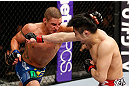SAITAMA, JAPAN - MARCH 03:  (L-R) Diego Sanchez and Takanori Gomi trade punches in their lightweight fight during the UFC on FUEL TV event at Saitama Super Arena on March 3, 2013 in Saitama, Japan.  (Photo by Josh Hedges/Zuffa LLC/Zuffa LLC via Getty Images)