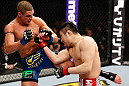 SAITAMA, JAPAN - MARCH 03:  (L-R) Diego Sanchez kicks Takanori Gomi in their lightweight fight during the UFC on FUEL TV event at Saitama Super Arena on March 3, 2013 in Saitama, Japan.  (Photo by Josh Hedges/Zuffa LLC/Zuffa LLC via Getty Images)