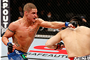 SAITAMA, JAPAN - MARCH 03:  (L-R) Diego Sanchez punches Takanori Gomi in their lightweight fight during the UFC on FUEL TV event at Saitama Super Arena on March 3, 2013 in Saitama, Japan.  (Photo by Josh Hedges/Zuffa LLC/Zuffa LLC via Getty Images)