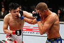 SAITAMA, JAPAN - MARCH 03:  (L-R) Takanori Gomi punches Diego Sanchez in their lightweight fight during the UFC on FUEL TV event at Saitama Super Arena on March 3, 2013 in Saitama, Japan.  (Photo by Josh Hedges/Zuffa LLC/Zuffa LLC via Getty Images)