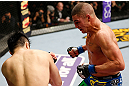 SAITAMA, JAPAN - MARCH 03:  (R-L) Diego Sanchez punches Takanori Gomi in their lightweight fight during the UFC on FUEL TV event at Saitama Super Arena on March 3, 2013 in Saitama, Japan.  (Photo by Josh Hedges/Zuffa LLC/Zuffa LLC via Getty Images)