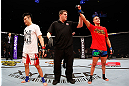 SAITAMA, JAPAN - MARCH 03:  Diego Sanchez (R) reacts after defeating Takanori Gomi (L) in their lightweight fight during the UFC on FUEL TV event at Saitama Super Arena on March 3, 2013 in Saitama, Japan.  (Photo by Josh Hedges/Zuffa LLC/Zuffa LLC via Getty Images)