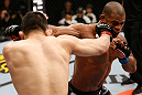 SAITAMA, JAPAN - MARCH 03:  (L-R) Yushin Okami punches Hector Lombard in their middleweight fight during the UFC on FUEL TV event at Saitama Super Arena on March 3, 2013 in Saitama, Japan.  (Photo by Josh Hedges/Zuffa LLC/Zuffa LLC via Getty Images)