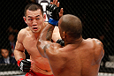 SAITAMA, JAPAN - MARCH 03:  (L-R) Yushin Okami punches Hector Lombard in their middleweight fight during the UFC on FUEL TV event at Saitama Super Arena on March 3, 2013 in Saitama, Japan.  (Photo by Josh Hedges/Zuffa LLC/Zuffa LLC via Getty Images)