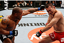 SAITAMA, JAPAN - MARCH 03:  (L-R) Hector Lombard punches Yushin Okami in their middleweight fight during the UFC on FUEL TV event at Saitama Super Arena on March 3, 2013 in Saitama, Japan.  (Photo by Josh Hedges/Zuffa LLC/Zuffa LLC via Getty Images)