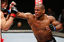 SAITAMA, JAPAN - MARCH 03:  (R-L) Hector Lombard punches Yushin Okami in their middleweight fight during the UFC on FUEL TV event at Saitama Super Arena on March 3, 2013 in Saitama, Japan.  (Photo by Josh Hedges/Zuffa LLC/Zuffa LLC via Getty Images)