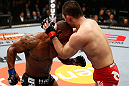 SAITAMA, JAPAN - MARCH 03:  (L-R) Hector Lombard punches Yushin Okami in their middleweight fight during the UFC on FUEL TV event at Saitama Super Arena on March 3, 2013 in Saitama, Japan.  (Photo by Josh Hedges/Zuffa LLC/Zuffa LLC via Getty Images)