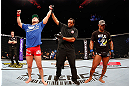 SAITAMA, JAPAN - MARCH 03:  Yushin Okami (L) reacts after defeating Hector Lombard in their middleweight fight during the UFC on FUEL TV event at Saitama Super Arena on March 3, 2013 in Saitama, Japan.  (Photo by Josh Hedges/Zuffa LLC/Zuffa LLC via Getty Images)