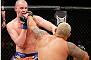 SAITAMA, JAPAN - MARCH 03:  (R-L) Mark Hunt punches Stefan Struve in their heavyweight fight during the UFC on FUEL TV event at Saitama Super Arena on March 3, 2013 in Saitama, Japan.  (Photo by Josh Hedges/Zuffa LLC/Zuffa LLC via Getty Images)