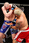 SAITAMA, JAPAN - MARCH 03:  (R-L) Mark Hunt punches Stefan Struve in their heavyweight fight during the UFC on FUEL TV event at Saitama Super Arena on March 3, 2013 in Saitama, Japan.  (Photo by Josh Hedges/Zuffa LLC/Zuffa LLC via Getty Images)