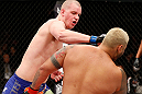 SAITAMA, JAPAN - MARCH 03:  (L-R) Stefan Struve punches Mark Hunt in their heavyweight fight during the UFC on FUEL TV event at Saitama Super Arena on March 3, 2013 in Saitama, Japan.  (Photo by Josh Hedges/Zuffa LLC/Zuffa LLC via Getty Images)