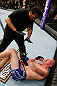 SAITAMA, JAPAN - MARCH 03:  (R-L) Stefan Struve points to his jaw as referee Herb Dean stops his heavyweight fight against Mark Hunt during the UFC on FUEL TV event at Saitama Super Arena on March 3, 2013 in Saitama, Japan.  (Photo by Josh Hedges/Zuffa LLC/Zuffa LLC via Getty Images)