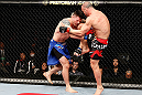 SAITAMA, JAPAN - MARCH 03:  (R-L) Wanderlei Silva knees Brian Stann in their light heavyweight fight during the UFC on FUEL TV event at Saitama Super Arena on March 3, 2013 in Saitama, Japan.  (Photo by Josh Hedges/Zuffa LLC/Zuffa LLC via Getty Images)