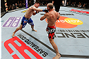 SAITAMA, JAPAN - MARCH 03:  (L-R) Brian Stann punches Wanderlei Silva in their light heavyweight fight during the UFC on FUEL TV event at Saitama Super Arena on March 3, 2013 in Saitama, Japan.  (Photo by Josh Hedges/Zuffa LLC/Zuffa LLC via Getty Images)