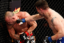 SAITAMA, JAPAN - MARCH 03:  (R-L) Brian Stann punches Wanderlei Silva in their light heavyweight fight during the UFC on FUEL TV event at Saitama Super Arena on March 3, 2013 in Saitama, Japan.  (Photo by Josh Hedges/Zuffa LLC/Zuffa LLC via Getty Images)