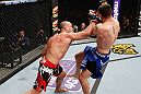 SAITAMA, JAPAN - MARCH 03:  (L-R) Wanderlei Silva punches Brian Stann in their light heavyweight fight during the UFC on FUEL TV event at Saitama Super Arena on March 3, 2013 in Saitama, Japan.  (Photo by Josh Hedges/Zuffa LLC/Zuffa LLC via Getty Images)