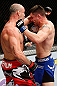 SAITAMA, JAPAN - MARCH 03:  (L-R) Wanderlei Silva and Brian Stann trade punches in their light heavyweight fight during the UFC on FUEL TV event at Saitama Super Arena on March 3, 2013 in Saitama, Japan.  (Photo by Josh Hedges/Zuffa LLC/Zuffa LLC via Getty Images)