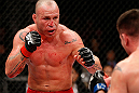 SAITAMA, JAPAN - MARCH 03:  (L-R) Wanderlei Silva squares off with Brian Stann in their light heavyweight fight during the UFC on FUEL TV event at Saitama Super Arena on March 3, 2013 in Saitama, Japan.  (Photo by Josh Hedges/Zuffa LLC/Zuffa LLC via Getty Images)