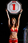 SAITAMA, JAPAN - MARCH 03:  UFC Octagon Girl Su-Jung Lee introduces a round during the UFC on FUEL TV event at Saitama Super Arena on March 3, 2013 in Saitama, Japan.  (Photo by Josh Hedges/Zuffa LLC/Zuffa LLC via Getty Images)